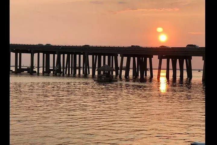 Original Destin Tikis Harbor Lights Cruise through Destin Harbor
