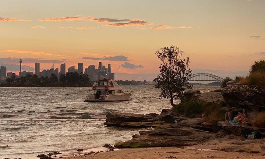 Image 1: Sydney: Golden Hour City Escape with Sunset, Picnic and Photos