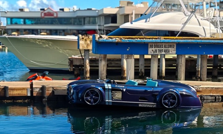 Image 5: San Juan Watersports Car Rental Blue Mercedes Classic