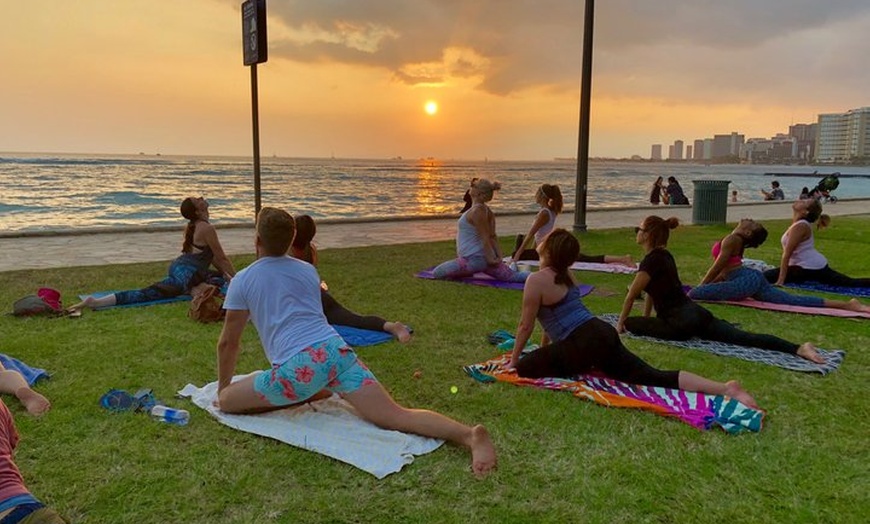 Image 14: Beach Yoga on Waikiki with Diamondhead Backdrop