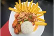 5% Cash Back at La Familia Latin Hot Food & Grocery - Second Medium