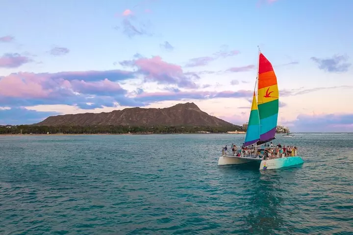 Board from Waikiki Beach for a scenic Sunset Sail on the Hāwea