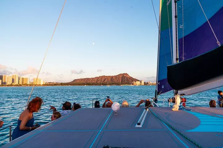 Board from Waikiki Beach for a scenic Sunset Sail on the Hāwea