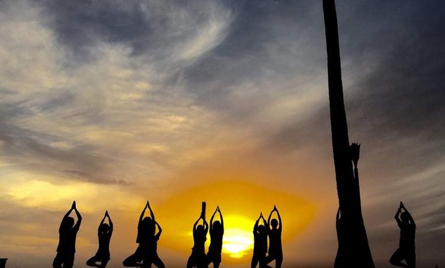Image 15: Beach Yoga on Waikiki with Diamondhead Backdrop