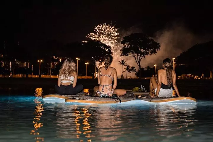 Night SUP Yoga in Honolulu, Hawaii