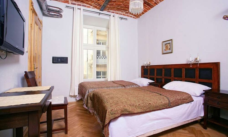 Image 2: ✈ POLAND | Krakow - Antique Apartments - Plac Szczepanski 3*, 2 nig...