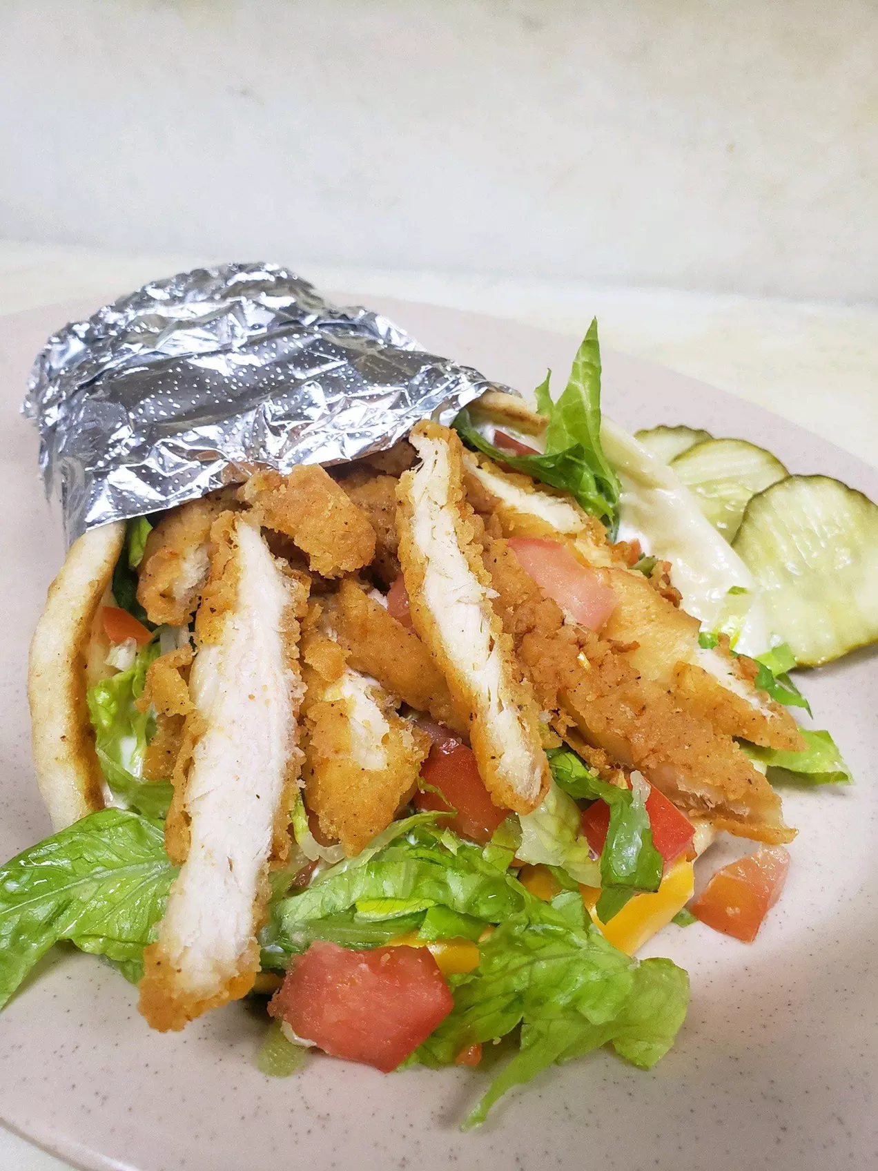 $15 For $30 Worth Of Burgers, Pitas, Fries & More