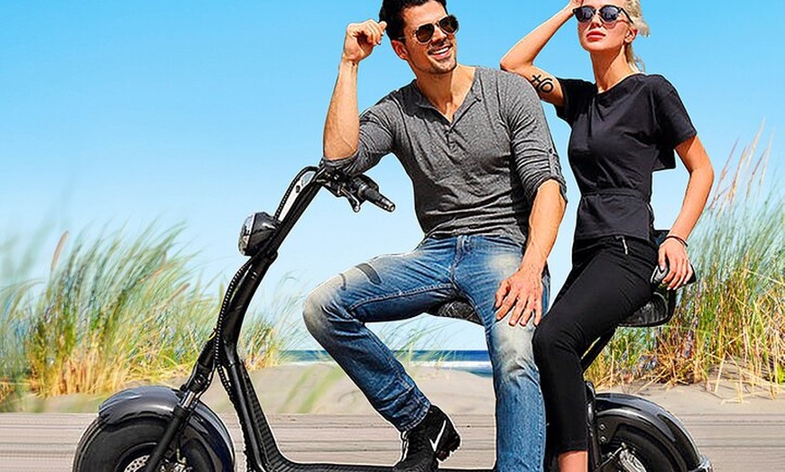 Image 14: Tour por la ciudad en e-scooter + Paseo en camello por las dunas de...