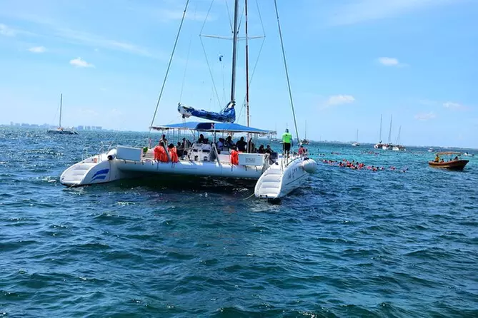 An Amazing Day of Catamaran ride to Isla Mujeres with Snorkel - Primary Image