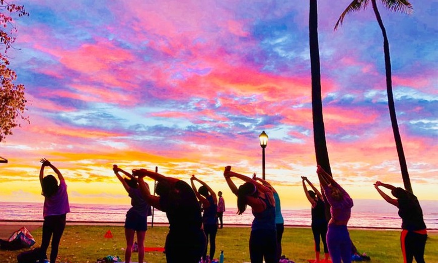 Image 12: Beach Yoga on Waikiki with Diamondhead Backdrop