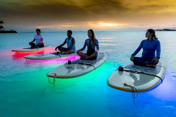 Night SUP Yoga in Honolulu, Hawaii