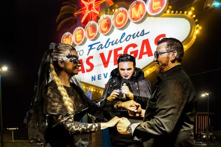 Goth Wedding or Vow Renewal at Vegas Sign with Props and Photos