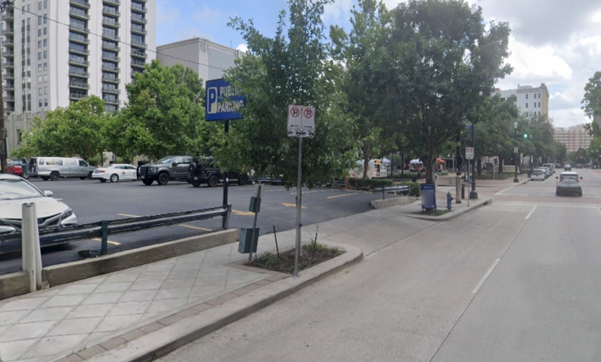 Image 2: Parking at 402 Travis St. Lot