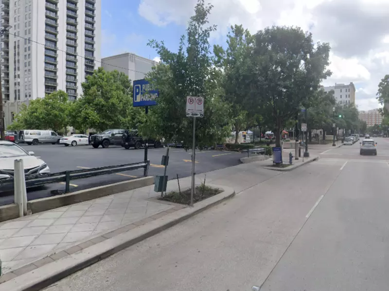 Parking at 402 Travis St. Lot