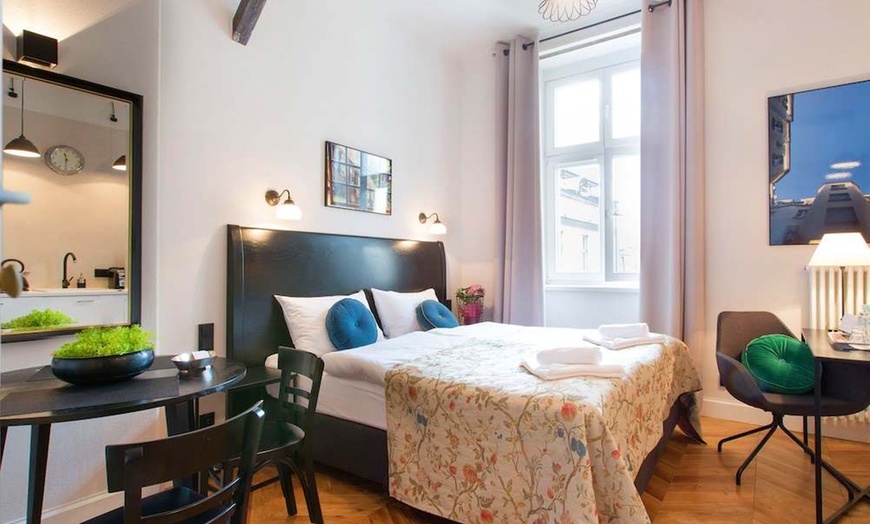 Image 1: ✈ POLAND | Krakow - Antique Apartments - Plac Szczepanski 3*, 2 nig...