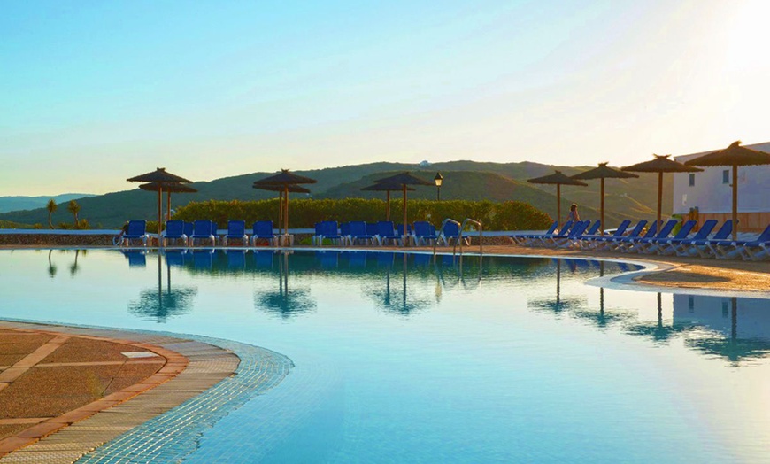 Image 2: ✈ MENORCA | Fornells - TRH Tirant Playa 4* - Outdoor swimming pool