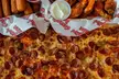 $18.50 For 1 Large Cheese Pizza & 1 Dozen Boneless Wings (Reg.$37) - Second Medium