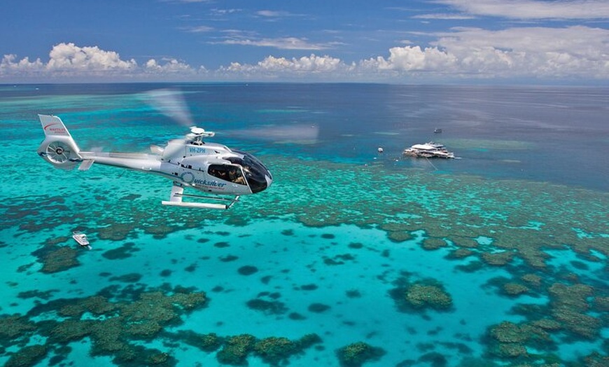 Image 1: Quicksilver Pontoon and 10 Minute Scenic Helicopter Flight
