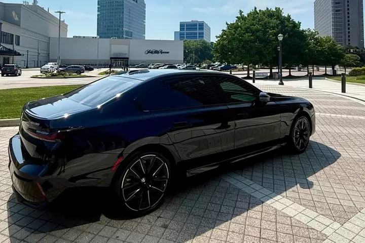 Luxury Airport Transfer in a BMW I7 E Drive 50