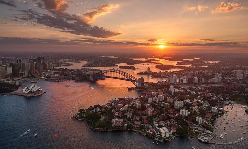 Image 1: Private Sunset Helicopter Flight Over Sydney & Beaches for 2 or 3 -...