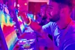 Paint a neon fluorescent picture while drinking unlimited wine - Second Medium
