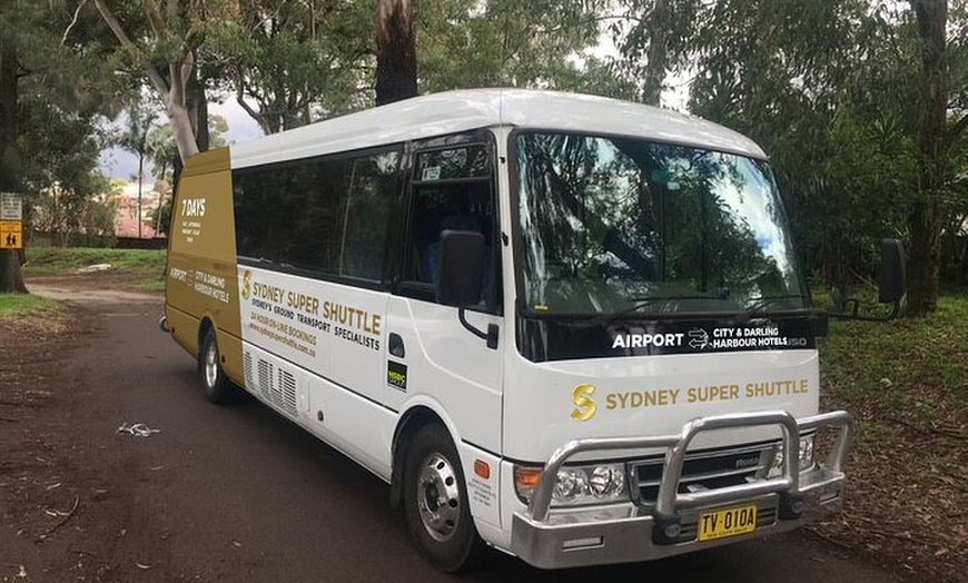 Image 1: Sydney Airport to Sydney CBD shared ride seat in vehicle shuttle tr...