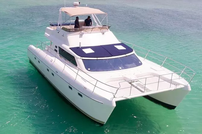 VIP 8-Hour Private 44' Motor Catamaran Tour to Tulum Sea w/Premium bar & Chef - Primary Image