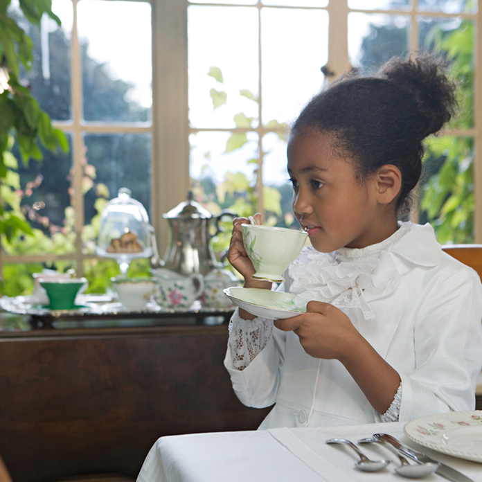 Little girl having tea at The Drake