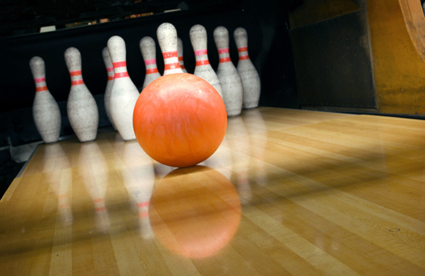 bowling shoes, bowling pins and ball for play in bowling