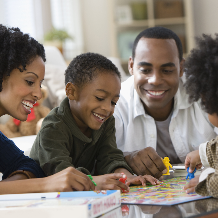 family playing a board game