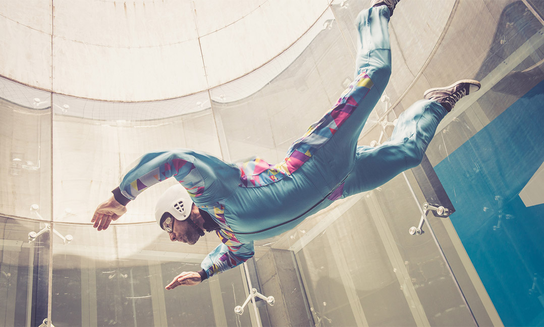 Male-flying-in-indoor-skydiving