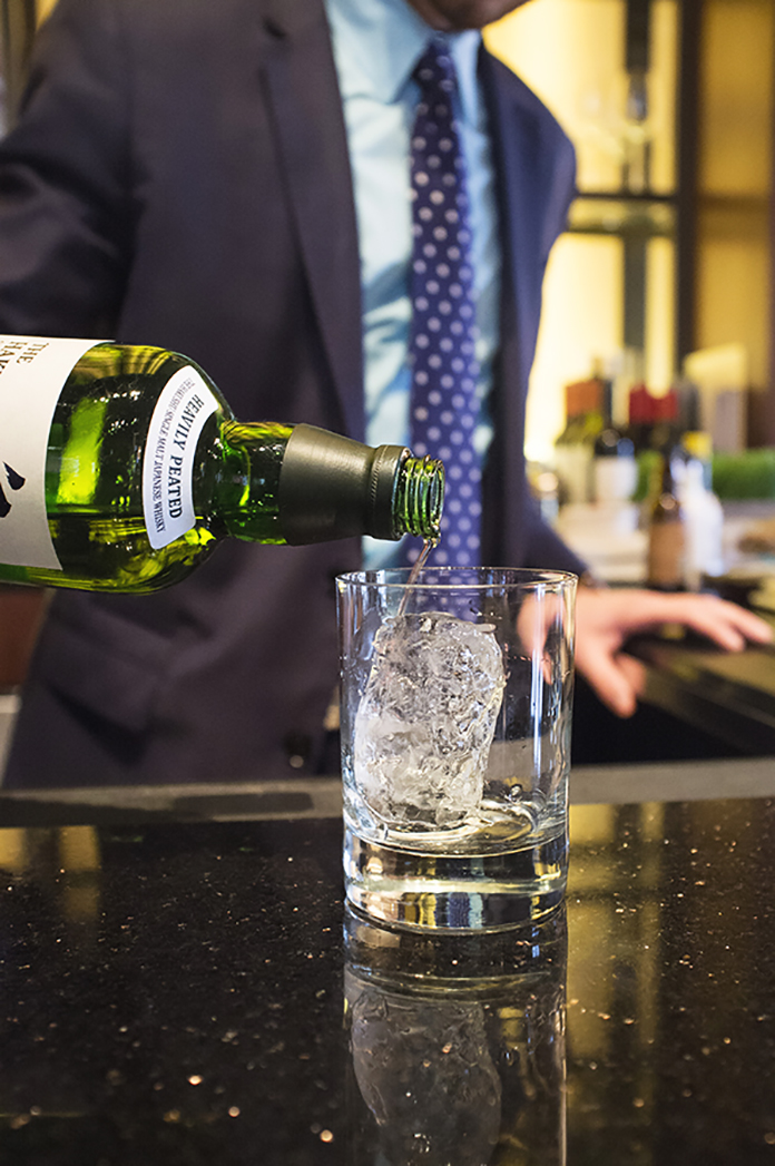 pouring whiskey