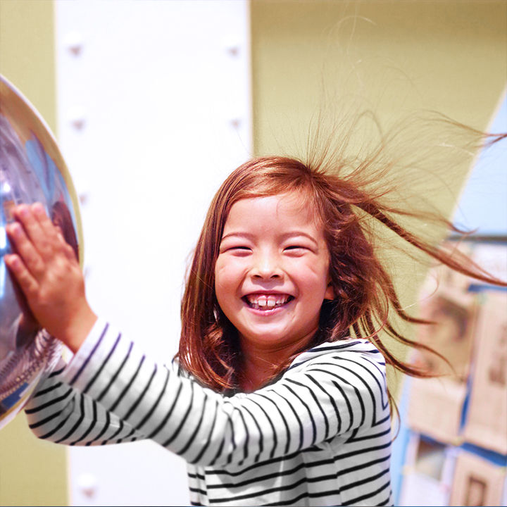 Child enjoying a museum