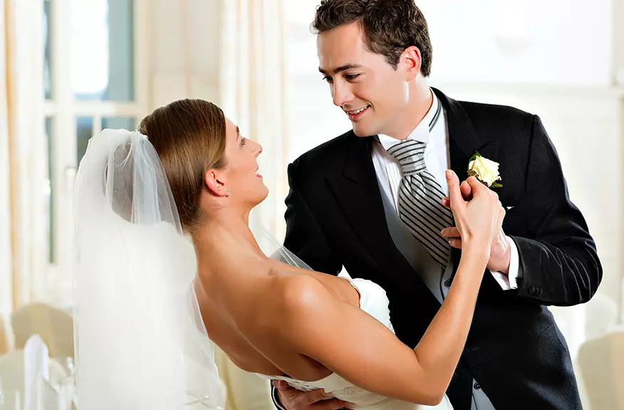 buff couple dancing at wedding
