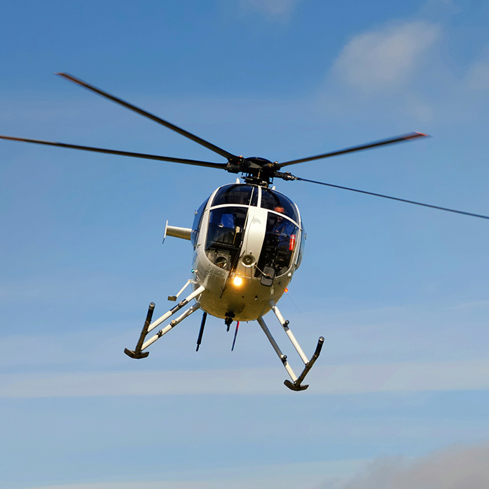 Woman enjoying a helicopter ride