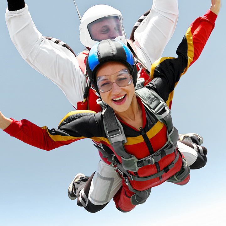 Couple doing tandem skydiving