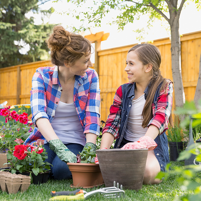 mom and daughter gardening