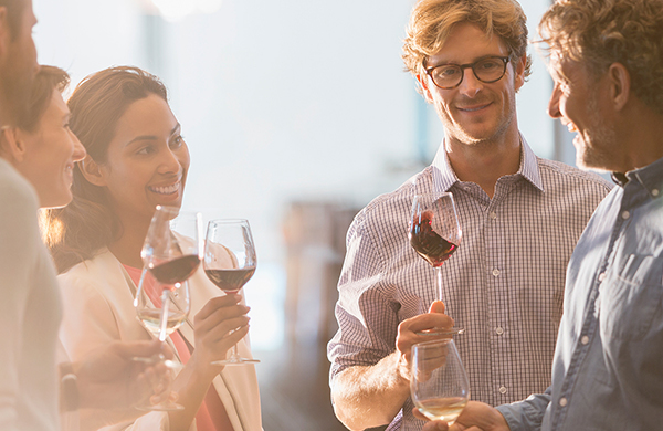 Group of people at red and white wine tasting