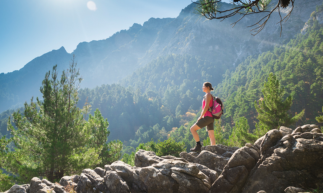 woman hiking for earth day