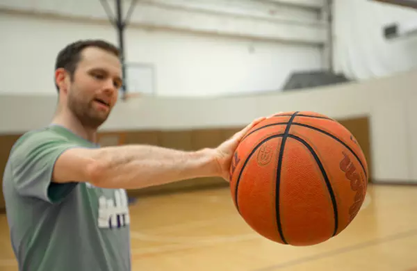 Basketball Player Holding Ball
