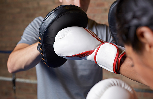 woman practicing cross punch kickboxing jpg
