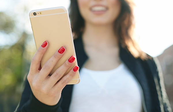 Woman holding smartphone