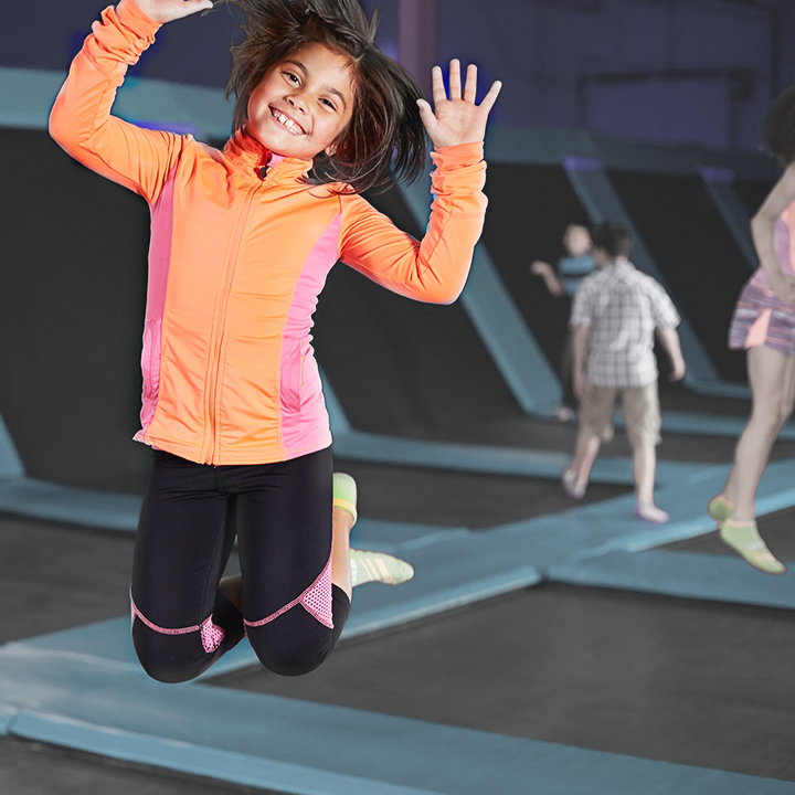 Child enjoying a trampoline park