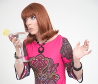 Drag star drinking cocktail