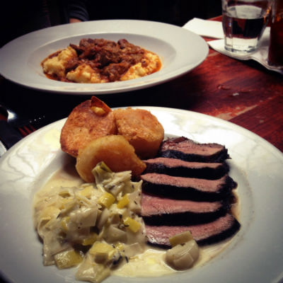 A plate of sliced roast meat with vegetables at the Canton Arms in London