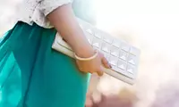 spring outfit with metallic clutch