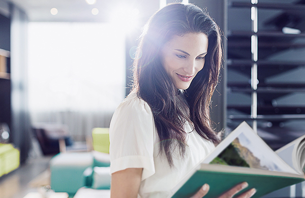 woman holding photo book