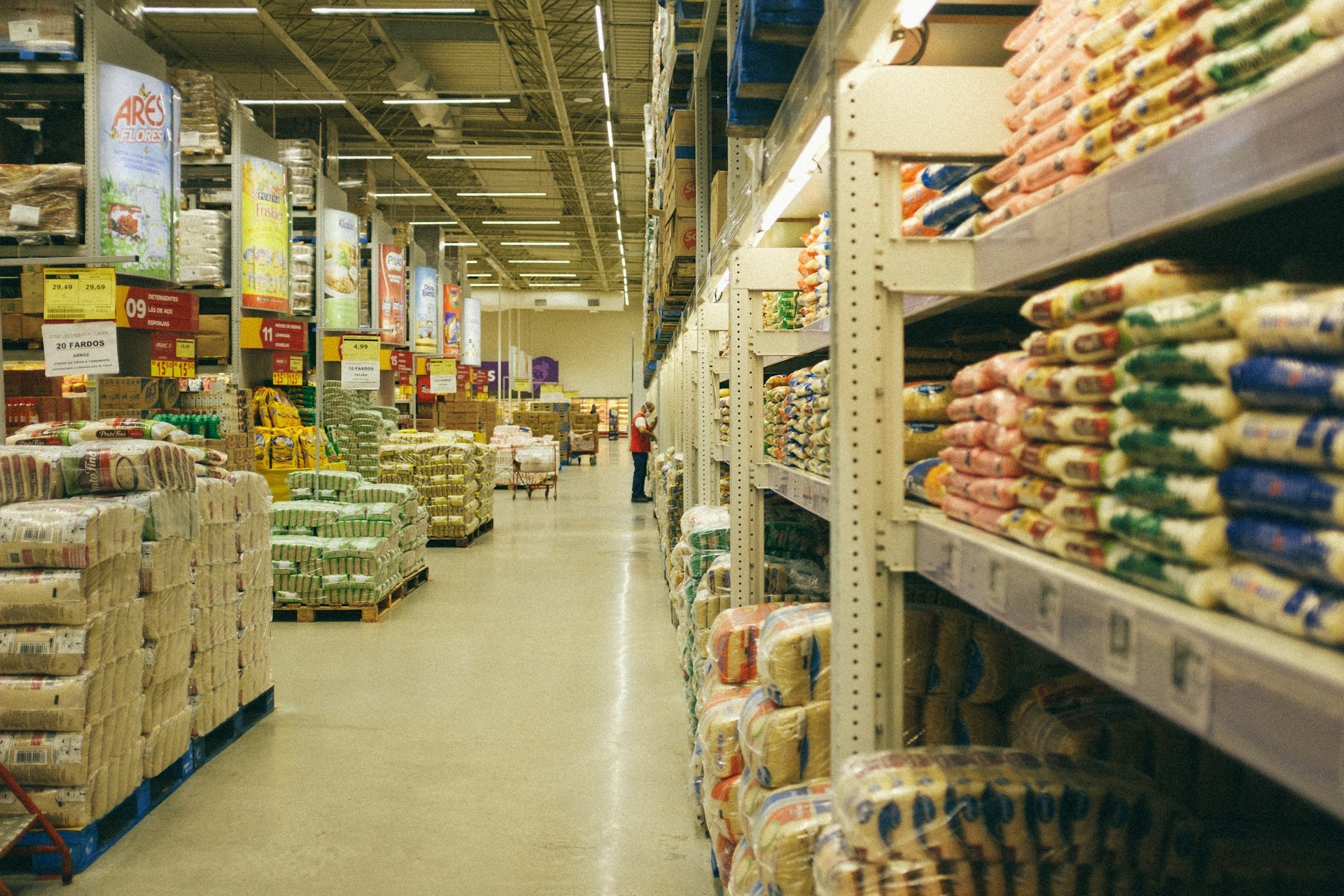 Warehouse club shopping aisle with bulk products