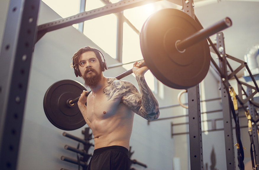 man lifting weights