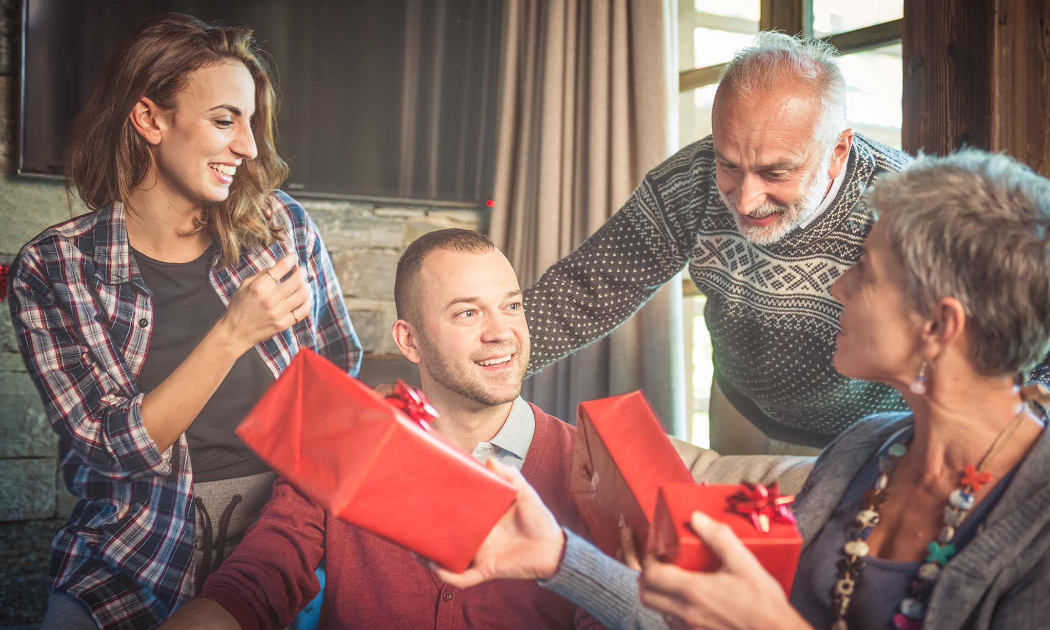 Family exchanging gifts